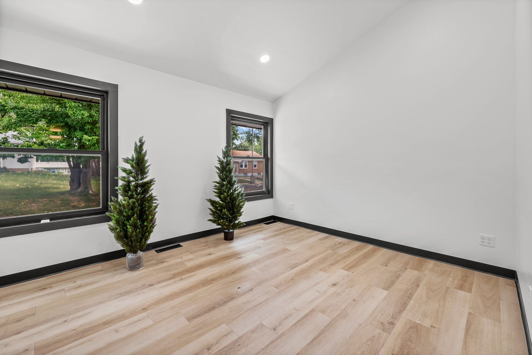 Empty blank-canvas salon suite with windows in St. Charles, Missouri